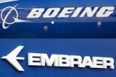 Logos das companhias aéreas Boeing (EUA) e Embraer (Brasil), que devem se fundir